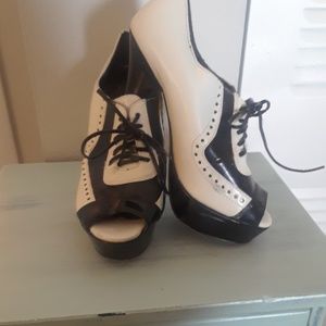 JLO lace up black and white booties
